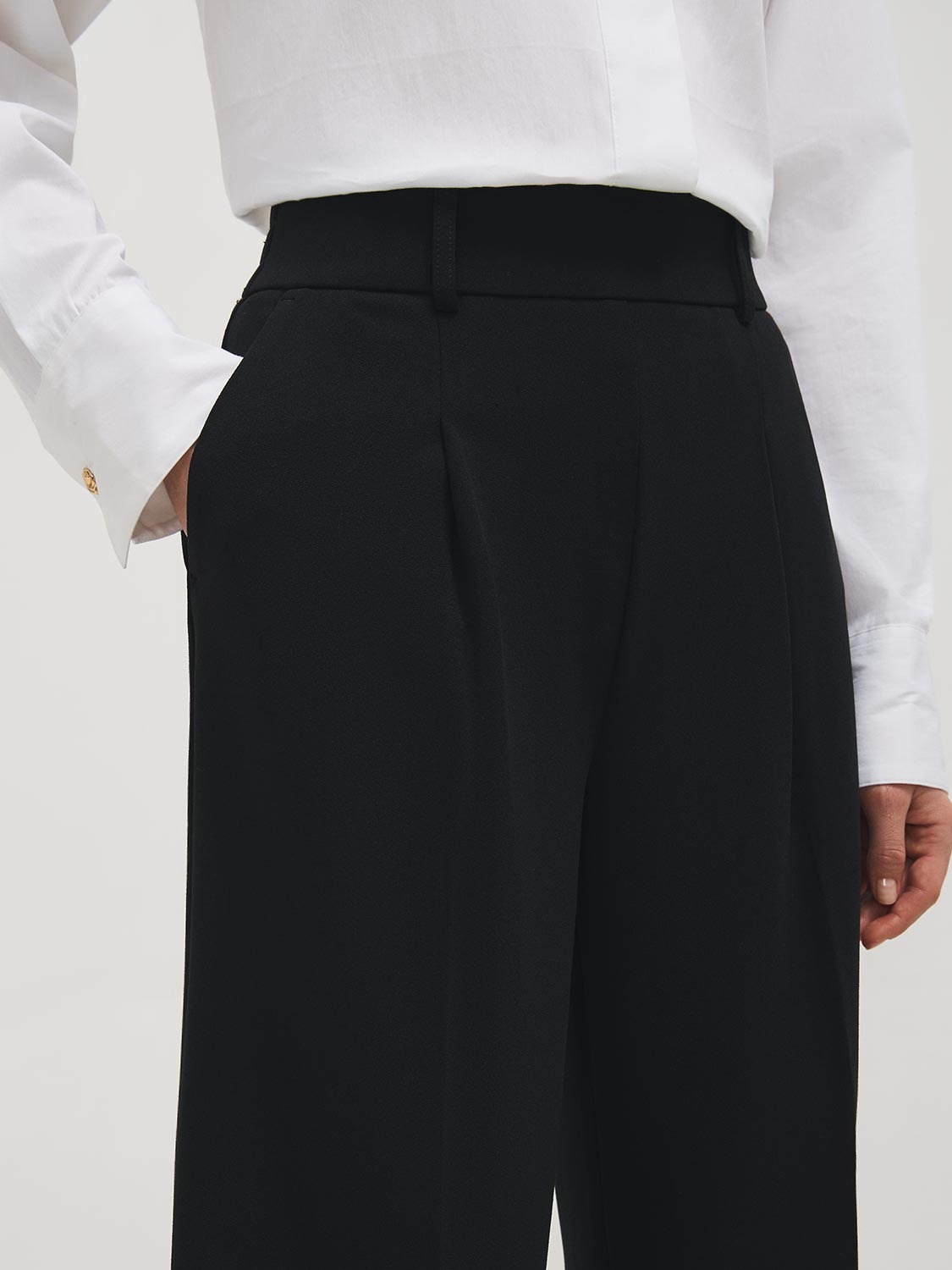Pantalon plissé ample en crêpe