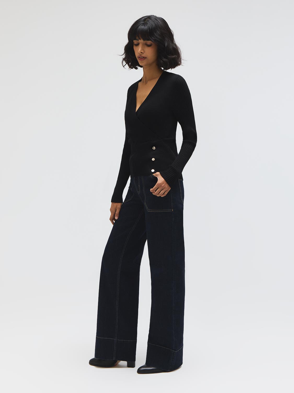 Pull cache-cœur boutonné