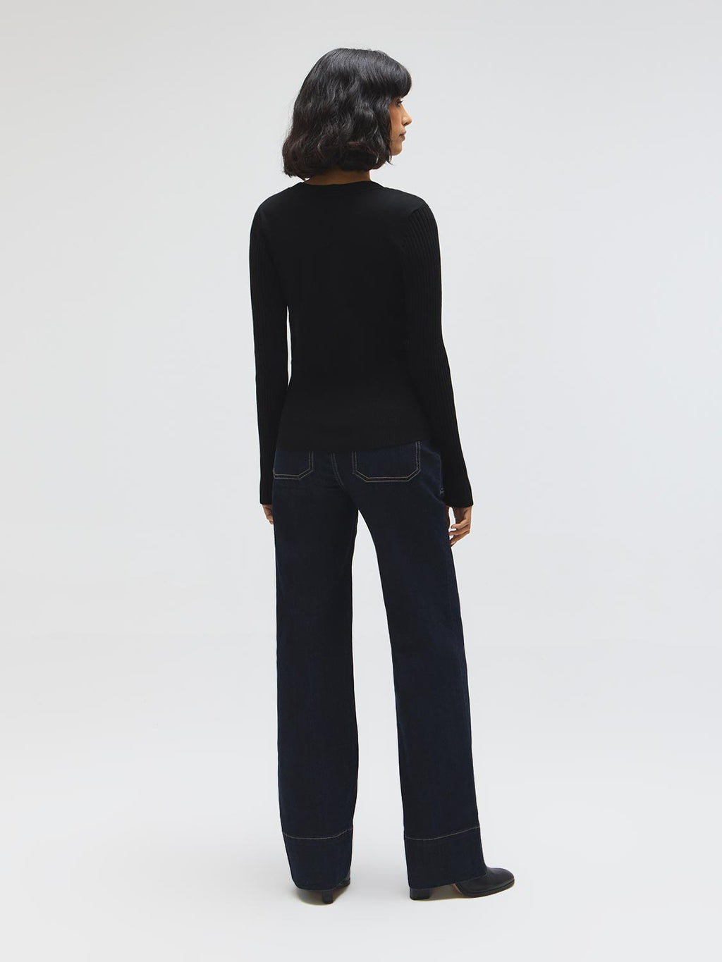 Pull cache-cœur boutonné