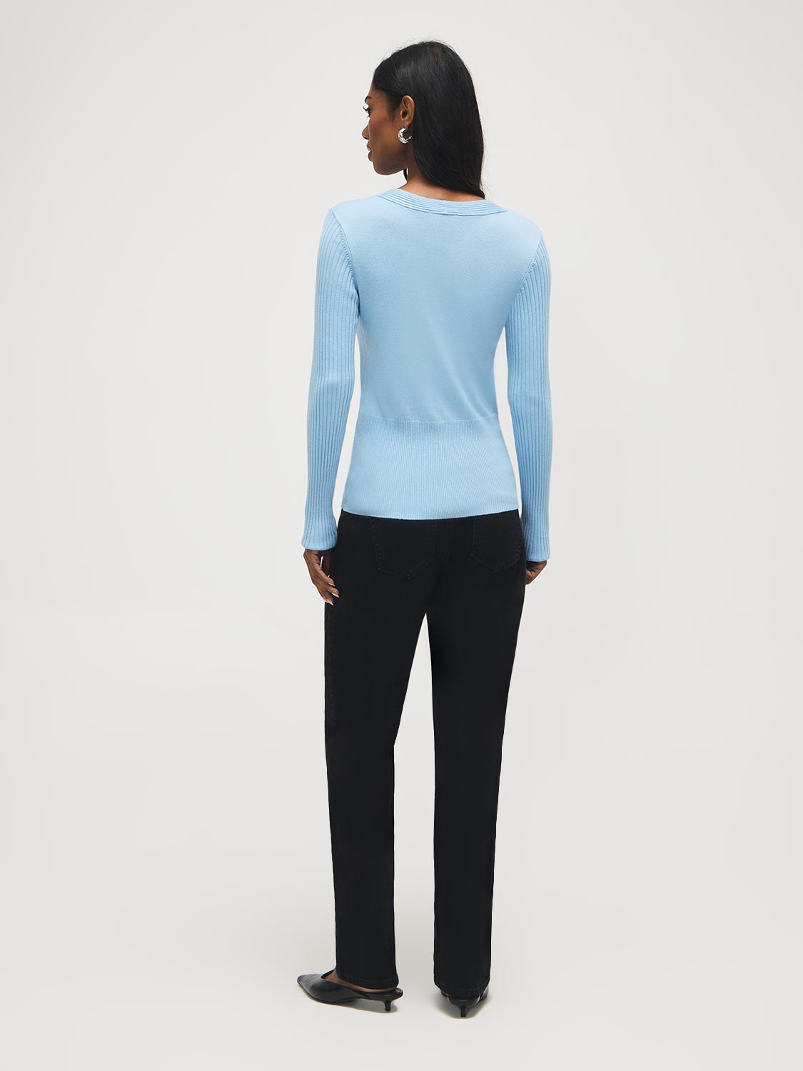 Pull cache-cœur boutonné