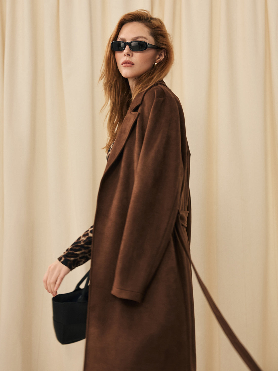 Manteau mi-long en faux daim